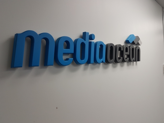 Cast aluminium 3D logo painted to match the colours for MEDIAOCEAN