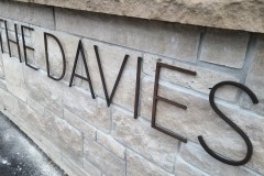 Custom-oxidized-bronze-3D-cut-letters-Davies
