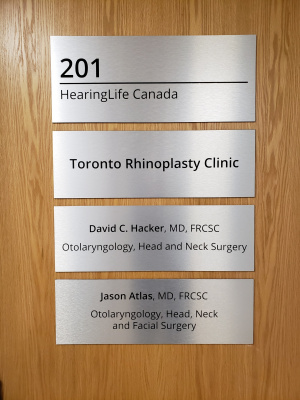 Brushed aluminum direction signs