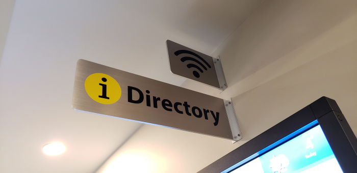Brushed steel directory signs