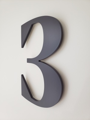 Custom raised aluminum door number "3"