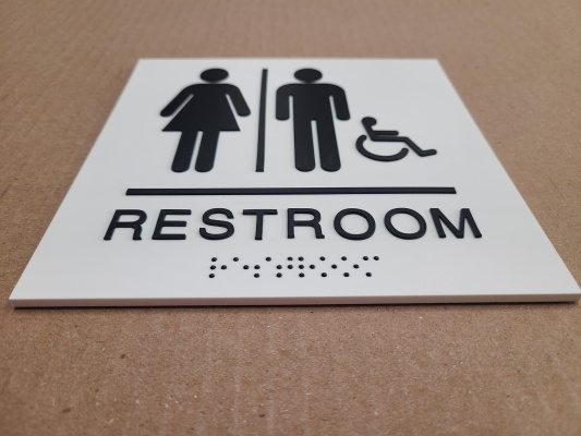 Custom-restroom-sign-with-raised-letters-and-braille