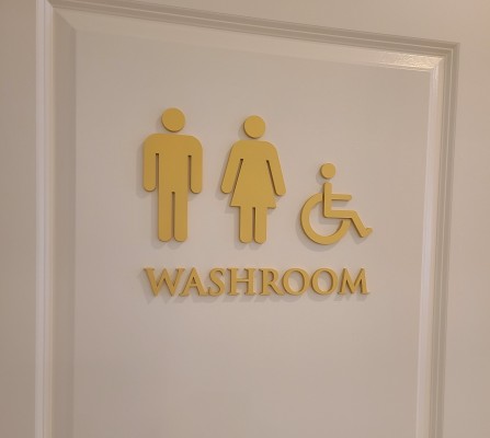 Washroom 3D cut acrylic sign - painted to custom Pantone color.