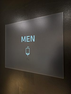 Men Washroom Sign  with raised graphics and braille. 