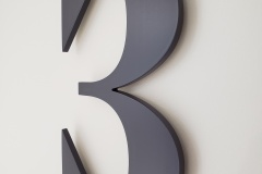 Custom raised aluminum door number "3"