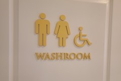 Washroom 3D cut acrylic sign - painted to custom Pantone color.