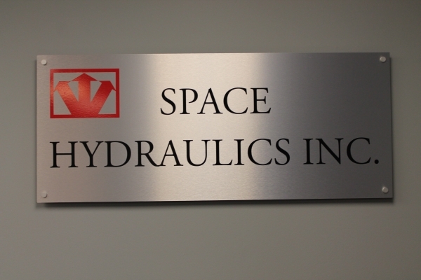 Brushed aluminium reception sign Space