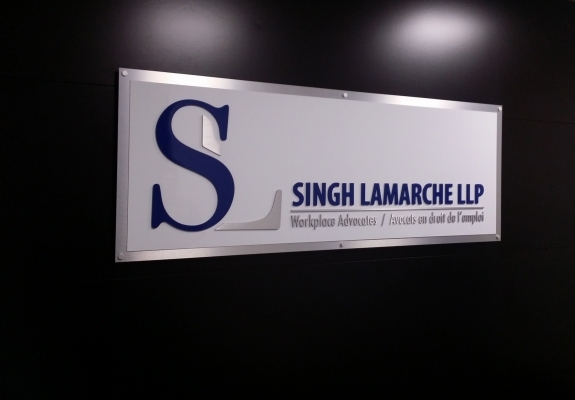 Singh Lamarche LLP custom 3D letters painted aluminium with double aluminium backer, installed with standoff pins.