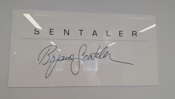 White acrylic lobby sign