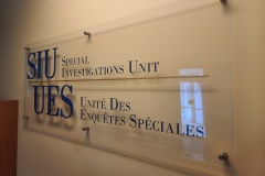 Custom-clear-acrylic-with-3D-raised-graphics-reception-sign-SIU