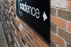 Custom acrylic sign with full color printed vinyl logo "Cadence"