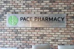 Frosted-acrylic-reception-sign-with-vinyl-graphics