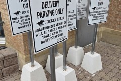 Custom aluminum parking signs-with concrete posts