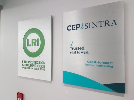 Custom etched brushed aluminium plaques with multi colours ink fill.