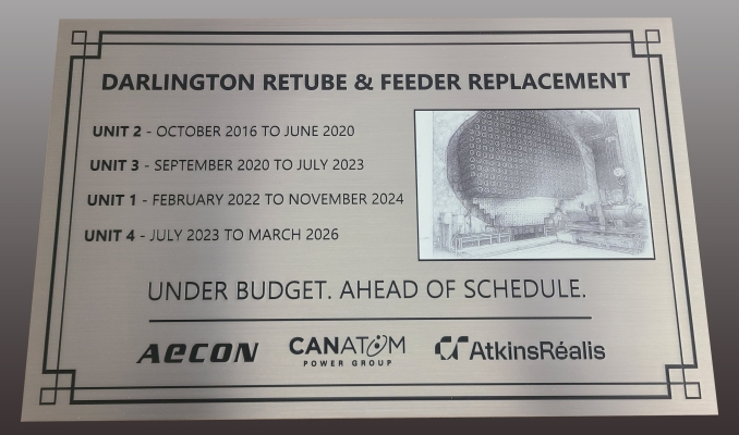 Customized stainless steel plaque with a printed image and etched text "Darlington"