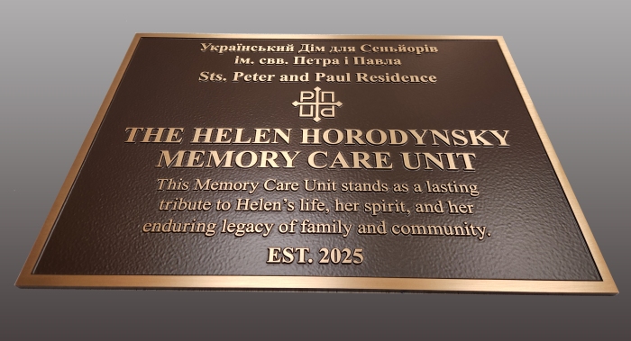 Custom Solid Bronze memory plaque with raised letters and border
