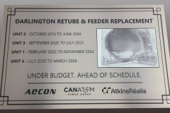 Customized stainless steel plaque with a printed image and etched text "Darlington"