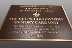 Custom Solid Bronze memory plaque with raised letters and border