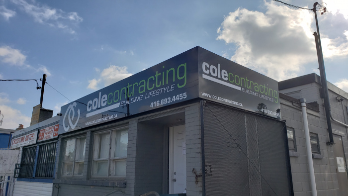 Black-aluminium-panels-with-vinyl-graphics-store-front