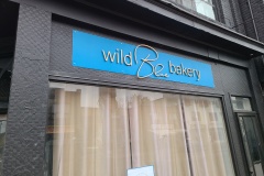 Custom-aluminium-sign-with-3D-cut-brushed-gold-logo